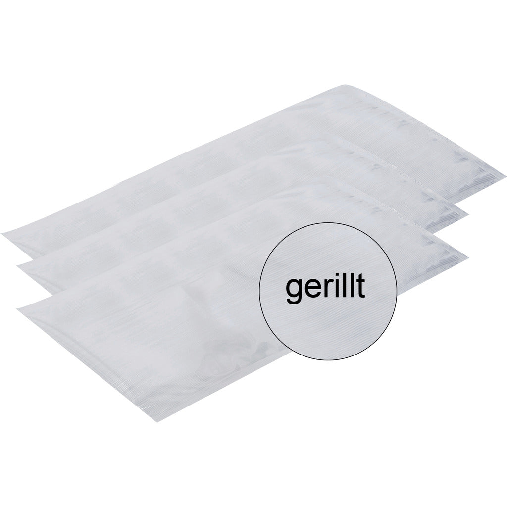 Vacuum bags with grooved structure