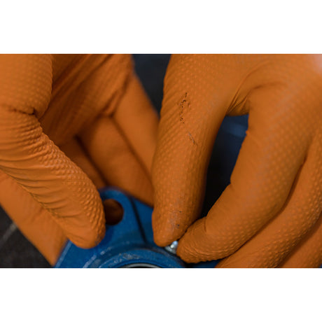 Guanti monouso in nitrile X-Grip arancioni