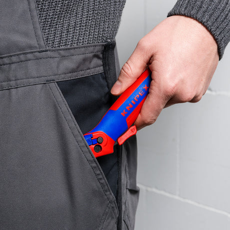 Coltello spelafili Knipex con pattino scorrevole e funzione a cricchetto